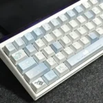 Blue Melody Cherry Keycap Set, Cherry profile custom set. Harmonious blue hues, clean front-printed legends, viewed from multiple angles for custom keyboard.