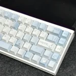 A close-up view of the Blue Melody Cherry Keycap Set showcasing their harmonious blue hues and clean front-printed legends, highlighting the premium Cherry profile.