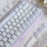 Gallery of Bluesy Flower Keycaps Set, showing the exquisite 'Flower Wall' artistic design from multiple angles, with serene blue and white PBT floral pattern.