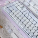 Multiple views of elegant Bluesy Flower PBT keycaps set showcasing the intricate 'Flower Wall' design with serene blue and white floral patterns.