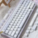 Bluesy Flower Keycaps Set gallery view, highlighting the exquisite 'Flower Wall' PBT artistic design. Serene blue and white floral patterns evoke an elegant.