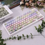 Artistic Spring Breeze Side-Lit PBT Keycaps Set displaying tranquil, impressionistic floral art for serene and immersive typing.