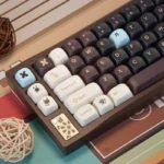 A different angle of the unique Brown Sugar Boba MOA profile keycaps set, showing their playful warm brown and cream tones, sweetening your workspace.