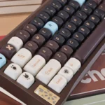 Multiple angles of the playful Brown Sugar Boba MOA keycaps set, showcasing their unique profile and warm brown and cream tones, bringing sweet charm.