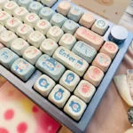 Close-up view of the adorable Milk Candy Bunny PBT keycap set, showcasing sweet pastel colors and charming bunny designs from a different angle.