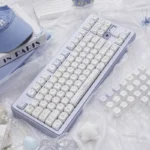 Close-up of adorable pastel bunny and dessert PBT MOA keycaps set, showcasing the whimsical dye-sub designs from a unique angle. Perfect for a charming design.