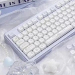 Close-up view of the adorable PBT dye-sub MOA Bunny Dessert keycaps set, highlighting whimsical pastel bunnies and sweet treats on a mechanical keyboard.