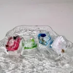 Nature's Bloom Butterfly Transparent Keycaps, showcasing delicate natural elements embedded in vibrant resin, presented from diverse artistic design.