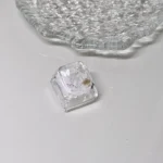 Nature's Bloom Butterfly Transparent Keycaps. Delicate embedded natural elements, vibrant in clear resin, highlighting its unique artistic craftmanship angles.