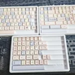 C Sugar Keycaps Set from a dynamic angle, revealing their vibrant, crisp dye-sub PBT legends and playful candy-inspired color palette, perfect for customization.