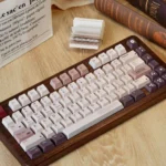 A detailed shot of the Retro Cgame 1989 Keycap Set, showcasing its durable PBT material and crisp, fade-proof dye-sub legends from a distinct angle.