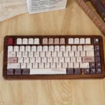 Retro Cgame 1989 Keycap Set showcasing durable PBT material and fade-proof dye-sub legends from multiple angles. Features a clean, classic color palette.