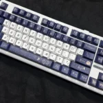 Gallery of elegant Camellia PBT keycaps set, featuring vibrant dye-sublimated floral designs and durable construction from diverse angles for refined keyboard.