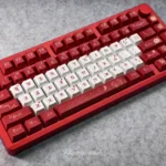 Durable PBT Camellia keycaps set displayed from multiple angles, highlighting exquisite dye-sublimated floral art for elegant keyboard personalization.