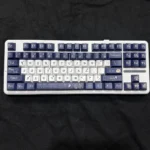 Detailed view of exquisite Camellia PBT keycaps set with durable dye-sublimated floral designs, highlighting their elegant aesthetic for custom mechanical keyboard.