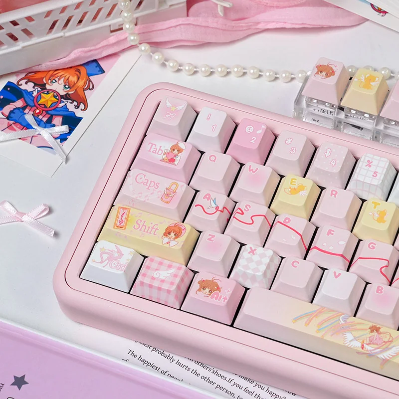 Close-up of the exclusive Cardcaptor Sakura keycap set, displaying its whimsical, vibrant design and magical anime aesthetic from a detailed, eye-level artistic view.