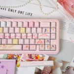 Multiple angles of the exclusive Cardcaptor Sakura keycap set, highlighting its whimsical charm, vibrant colors, and magical anime aesthetic for your keyboard.