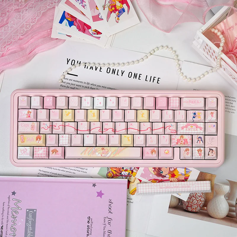 Close-up of an exclusive Cardcaptor Sakura keycap set, featuring vibrant magical girl anime aesthetics and whimsical charm, perfect for adding a playful design.