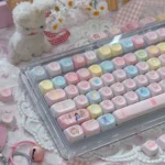 Complete Cardcaptor Sakura PBT keycap set from an artistic angle, featuring vibrant characters, magical symbols, and enchanting pastel colors.