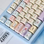 Close-up of MAO Cat Hide-and-Seek PBT keycap set, showcasing playful peeking cat characters and crisp legends from a unique angle.