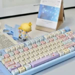 Adorable MAO Cat Hide-and-Seek PBT keycap set with playful peeking cat designs and clean legends, perfect for a fun keyboard.