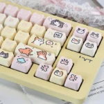 Adorable Hachimi Pixel Cat Meme Keycaps set, durable PBT, backlit-ready. Multiple angles reveal whimsical pixelated cat designs, adding vibrant retro charm.