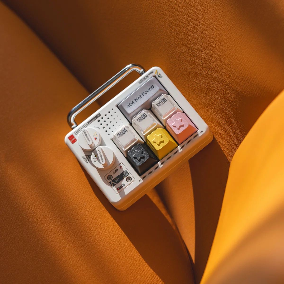 Close-up of a premium CNC machined Celestial Aluminum R4 keycap, showcasing its ethereal starry night sky design and cosmic hues from various angles.