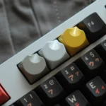 Celestial Moon Artisan Keycaps, highlighting its sleek moon-inspired metallic finish and ergonomic contours from a distinct angles.