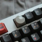 Celestial Moon Artisan Keycaps in a minimalist 'Plain Moon Linen' finish, reflecting subtle lunar hues.