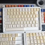 Whimsical Cheese PBT keycaps set. Dye-sub angled view of playful cheese blocks, premium quality shown.