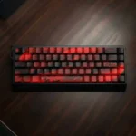 "Elegant black and red cherry blossom PBT dye-sub keycap set displayed from a unique angle, highlighting the crisp legends and premium feel."