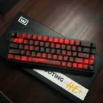 "Showcasing the premium PBT dye-sub Cherry Blossom keycap set with its elegant black and red artistic design."
