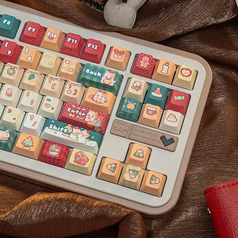 Adorable Christmas cat PBT keycaps set from the festive set, showcasing various whimsical holiday cat designs in cozy colors. Adds playful charm to keyboard.