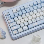 A delightful gallery view of the Dreamy Cinnamoroll Cloud PBT MOA Keycap Set, showing its whimsical pastel Cinnamoroll and cloud designs from every angles.
