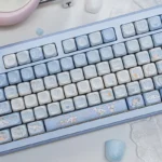 Dreamy Cinnamoroll Cloud PBT MOA Keycap Set, showcasing its whimsical pastel Cinnamoroll and cloud designs from various playful angles for a serene design.