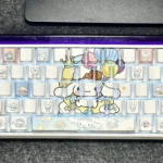 A gallery of Cinnamoroll side-lit PBT keycaps set, highlighting adorable character art, pastel colors, and durable glowing legends from various angles.