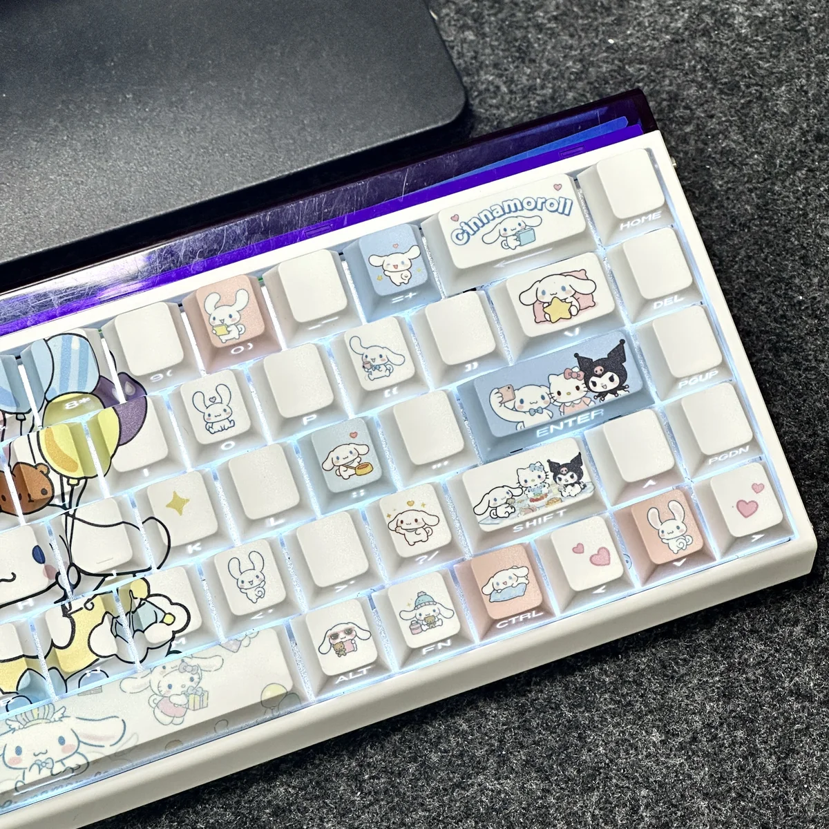 Sweet Cinnamoroll PBT keycaps set showcasing their durable, side-lit legends and delightful pastel hues from a charming new angle.