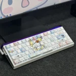 Adorable Cinnamoroll side-lit PBT keycaps set in pastel hues. Glowing side legends, viewed from angles, showcase durable legends and sweet charm.