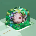 Explore the whimsical pastel pink handcrafted Clefairy Pokemon artisan ESC keycap, revealing its intricate miniature details and iconic charm.