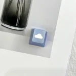 Side view of the premium CNC aluminum Ethereal Cloud Artisan Keycap, highlighting its precise R4 profile and the serene, polished cloud design.