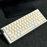 Ethereal Cloud Floral PBT Dye-Sub Keycap Set. Whimsical cloud and vibrant floral designs. Serene PBT dye-sub floral keycaps from a different artistic design.