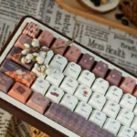 Serene Coffee PBT Keycaps Set, displaying durable PBT and crisp dye-sublimated legends. Warm coffee aesthetic for a sophisticated cafe ambiance.