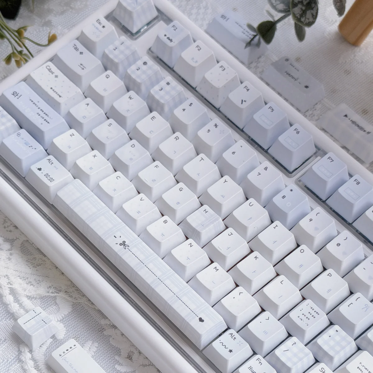 Confession Keycaps Set: Romantic pastel PBT dye-sublimated set, artfully displayed from various angles, emphasizing soft hues and gentle minimalist design.