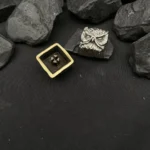 Mystical handcrafted pure copper owl artisan keycap, intricately detailed from a unique angle, with a vintage fantasy aesthetic for enchanted keyboard.