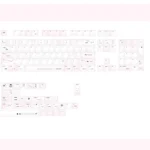 Artistic close-up of Crush PBT keycaps set, showcasing multiple angles. The durable PBT material features soft, ethereal colors and romantic motifs.