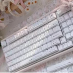 Crush PBT Keycaps Set main image, revealing durable PBT elegance with a soft, ethereal palette and subtle romantic motifs, echoing whispers of romance.
