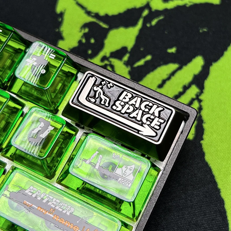 Gallery view of the defiant Shameless Custom Keycap, highlighting its premium metallic construction, bold industrial-chic design, and precise backspace key.