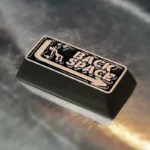 Shamless Keycap, bold industrial-chic design with defiant 'Shameless' engraving. Multiple views showcase the unique Backspace Key accent.