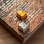 Whimsical handcrafted aluminum alloy cute sheep artisan keycap, showcasing its vibrant metallic finish and intricate details from various angles.