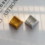 Close-up of a whimsical cute sheep keycap, showcasing the handcrafted aluminum alloy with vibrant colors and intricate details from a unique angle.